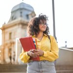 girl holding school books